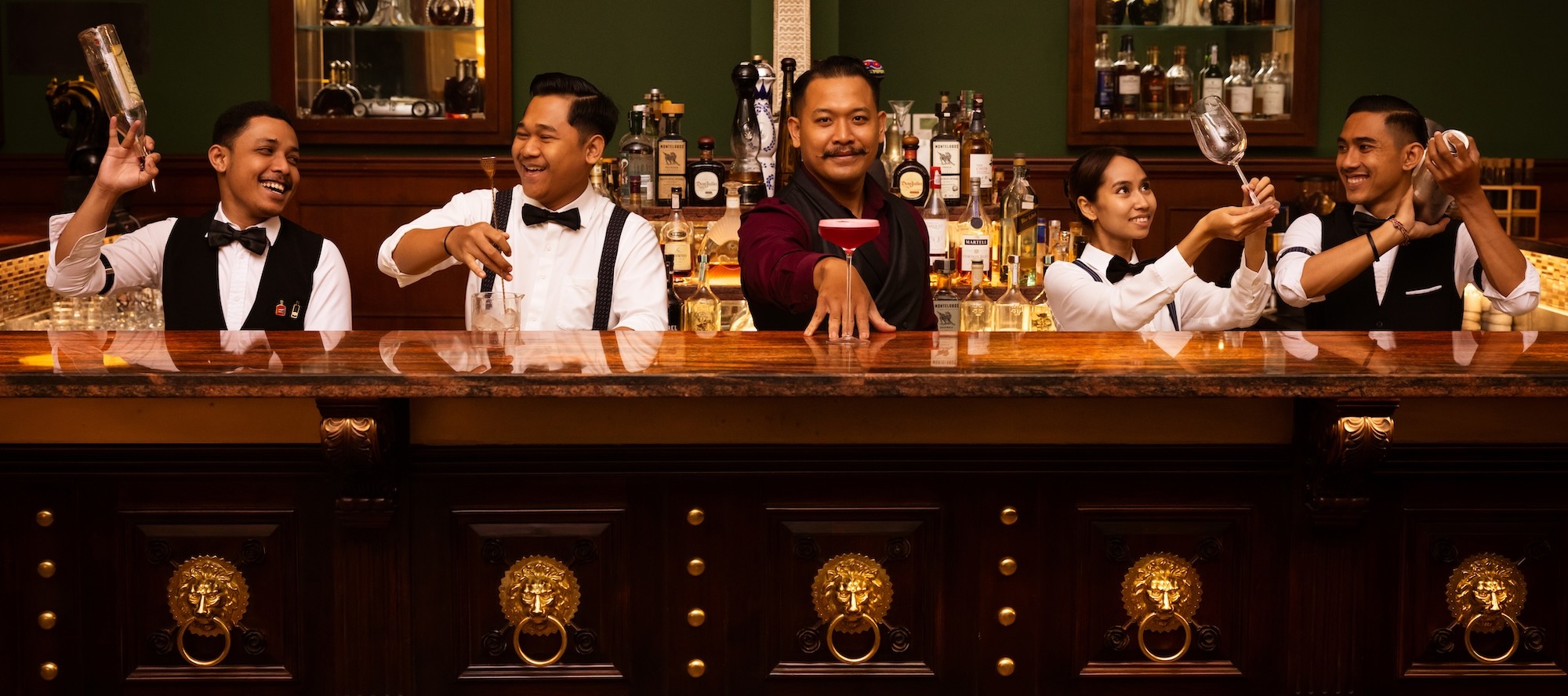 Elegant luxury hotel bar at Viceroy Bali, setting the scene for expert review with plush seating, ambient lighting, and a refined tropical atmosphere