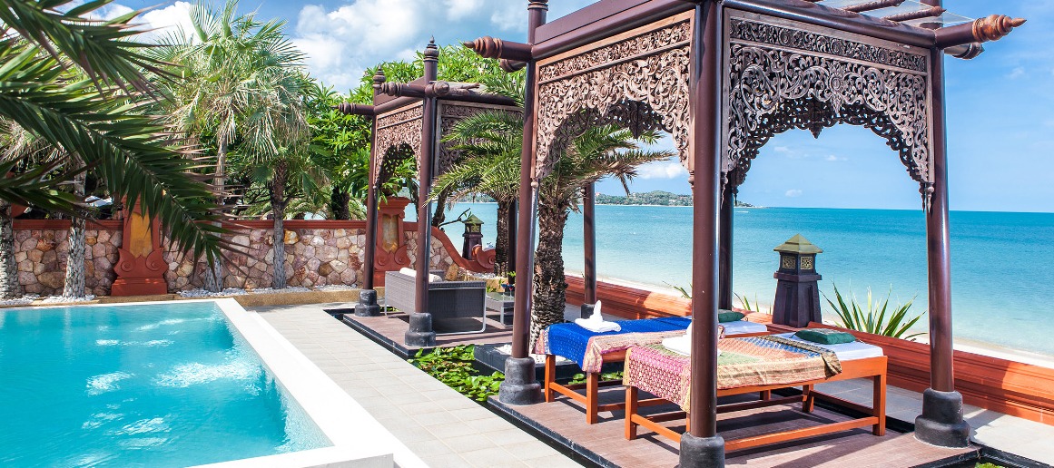 Ornate Thai pavilion with pool and ocean view 