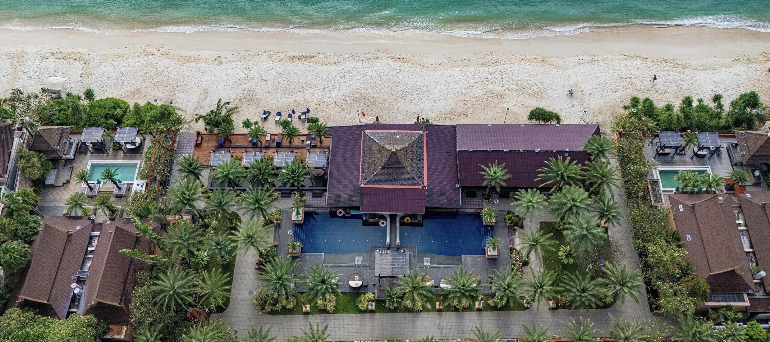 Aerial view of Ammatara Pura Pool resort with beach access