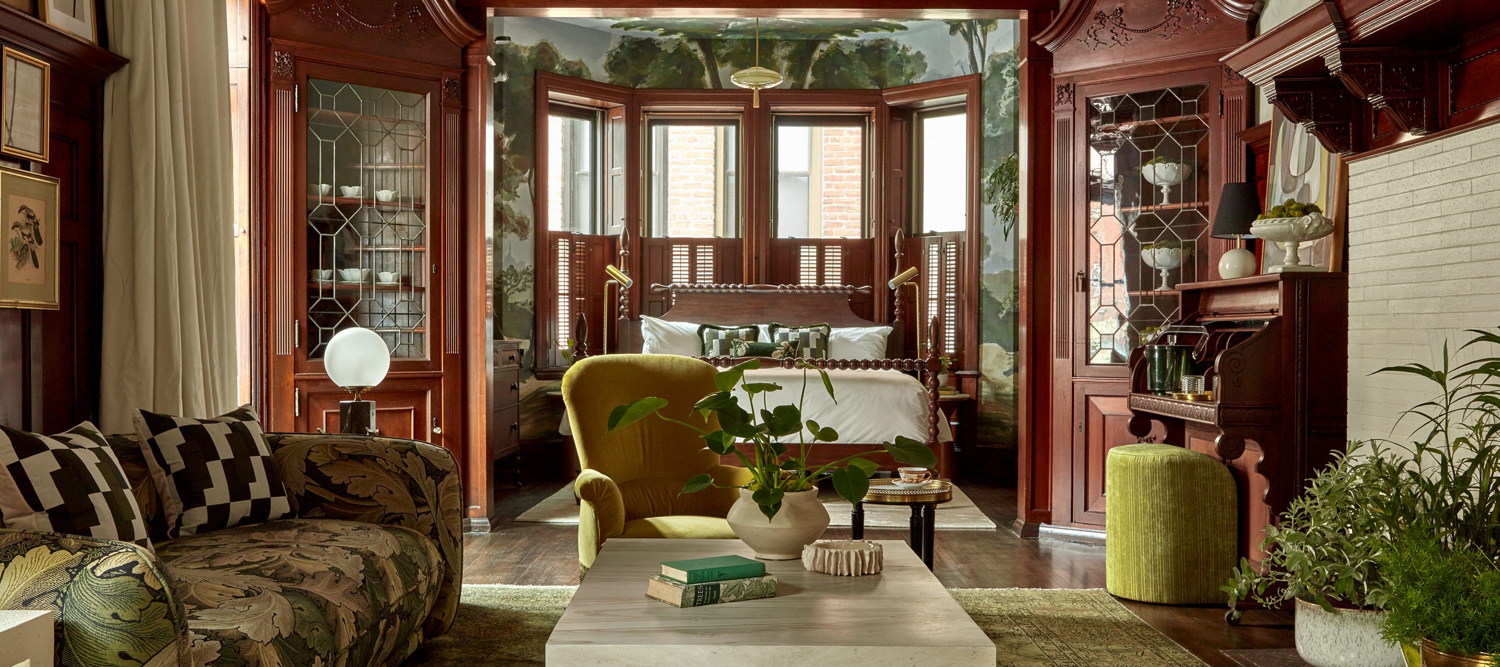 Grand hotel lounge featuring ornate woodwork and plush furnishings